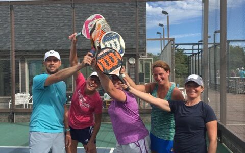 Camper waving on court