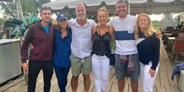 Coaching crew gathered on a Nantucket deck