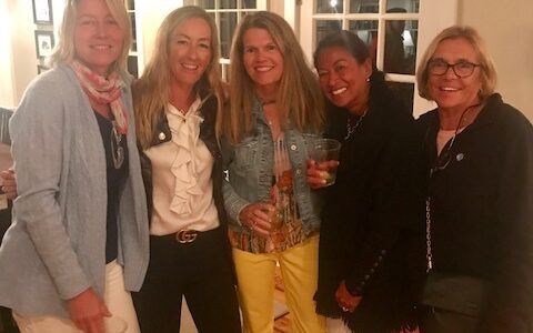 Campers at an evening social gathering