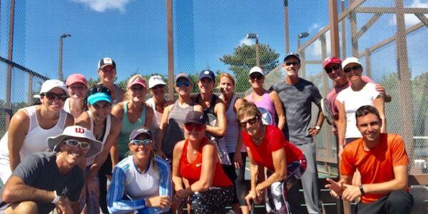 2019 camp session group on the courts