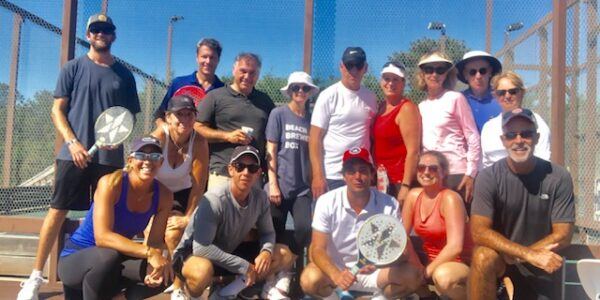 Mixed session group on the courts