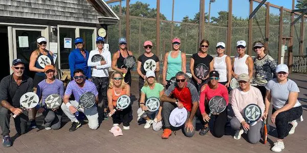 Full session group outside the clubhouse