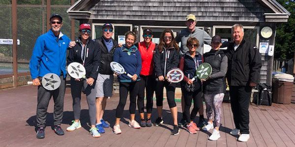 Session group in front of clubhouse