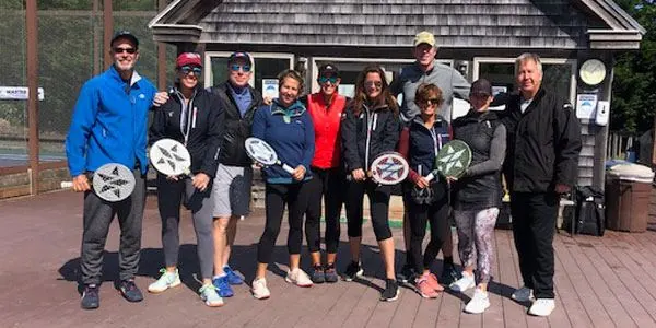 Session group in front of clubhouse