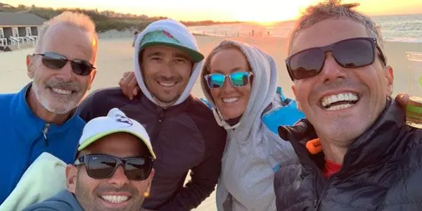 Beach sunset selfie with coaches