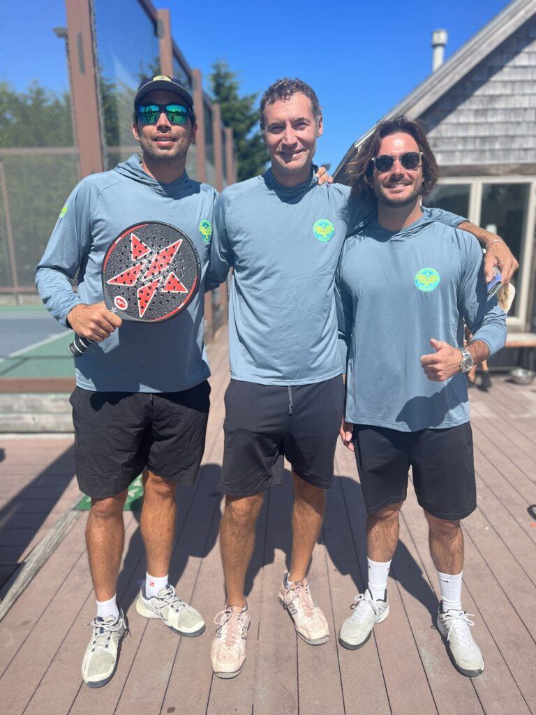 Three coaches on the clubhouse deck