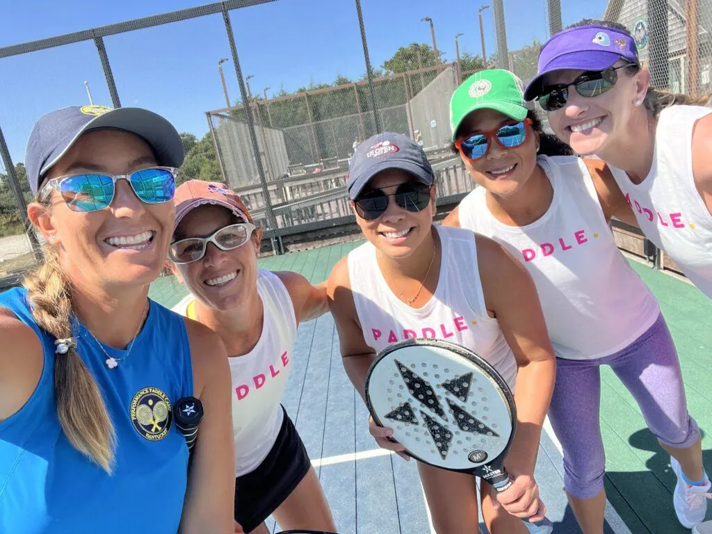 Paddle crew selfie on court