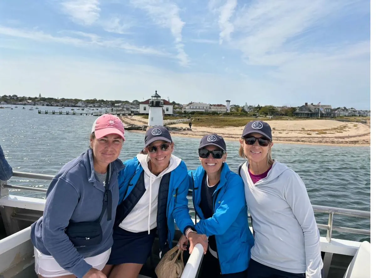 Women enjoying an evening social event