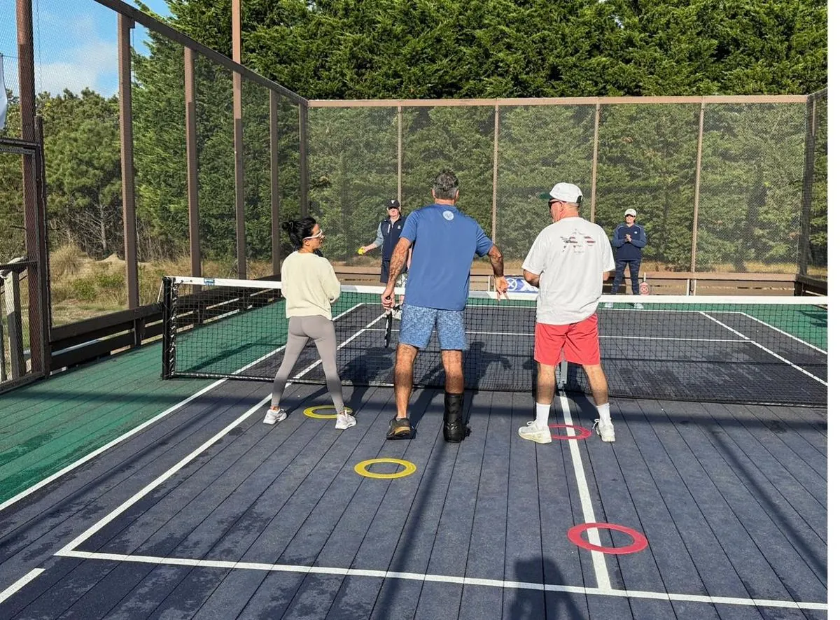 Mixed doubles drill with placement rings on court