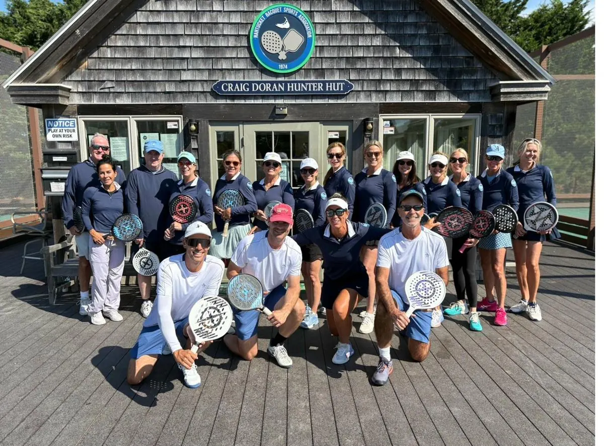 Full session group on the platform tennis courts